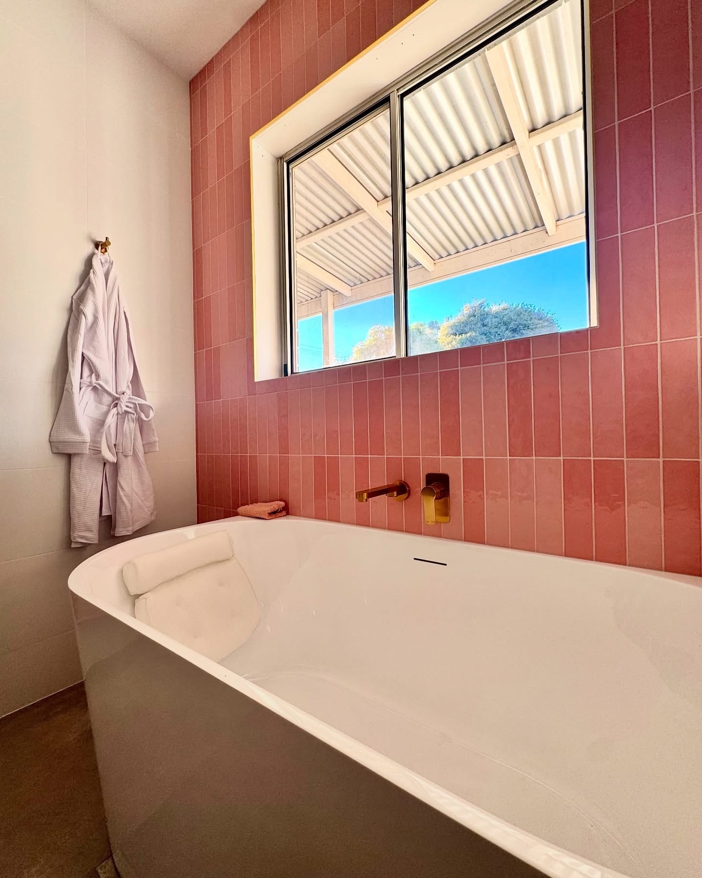 Modern bathroom vanity with timber and natural light